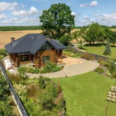Ile kosztuje dom z bali pod klucz? Zaskakujące ceny i koszty budowy